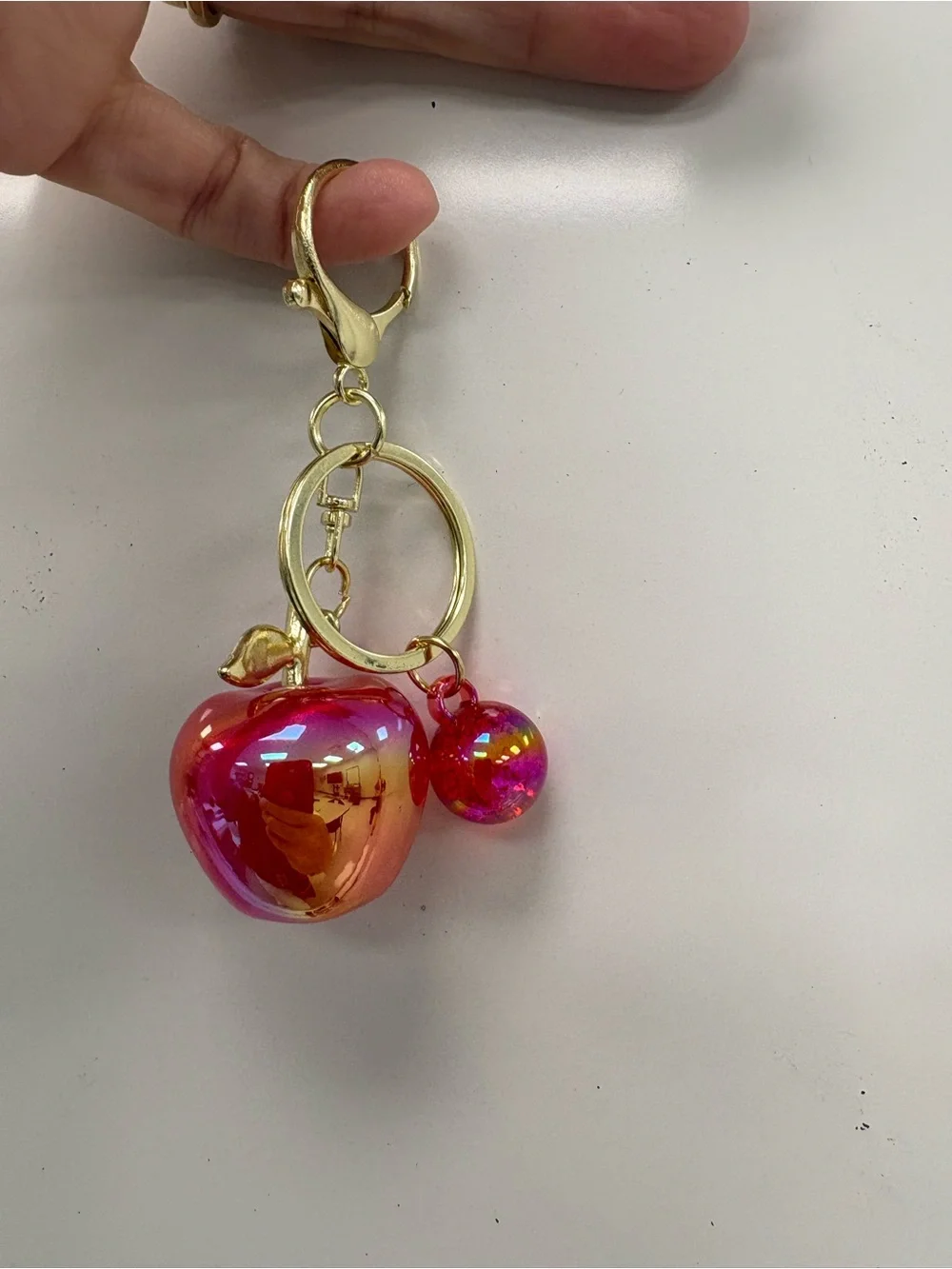Iridescent Pink Apple Keychain Bag Charm with Rhinestone Leaf Accent